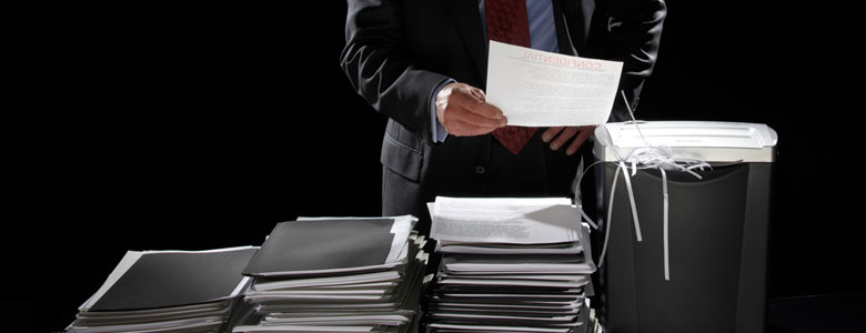 businessman shredding